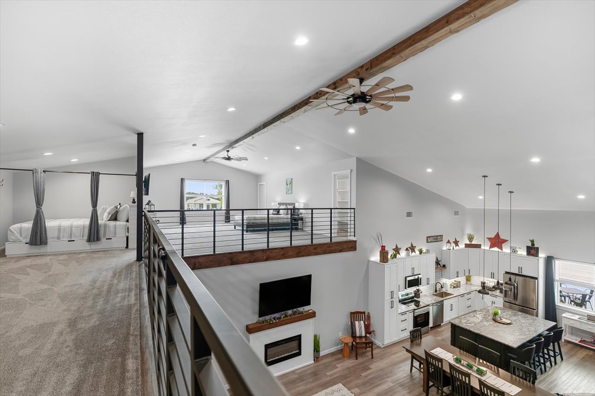 The hayloft — open second story overlooking the great room and kitchen